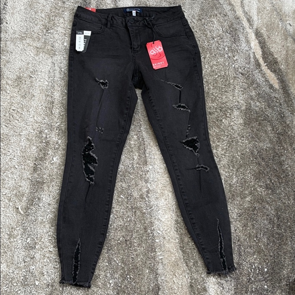 Black distress jeans with tags